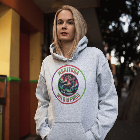 Stay connected to the wild with our Manitoba – Wild & Free hoodie, featuring a majestic deer standing under the vibrant northern lights.